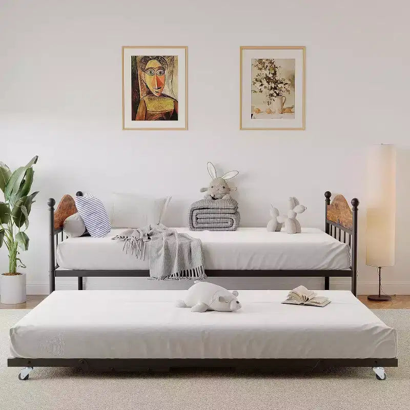 Twin Daybed with Trundle  Stylish Metal Sofa Bed Frame, Pop-Up Trundle, Perfect for Any Space