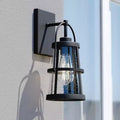 VAXCEL Portage Park 1 Light Black Dusk to Dawn Outdoor Wall Lantern Clear Glass