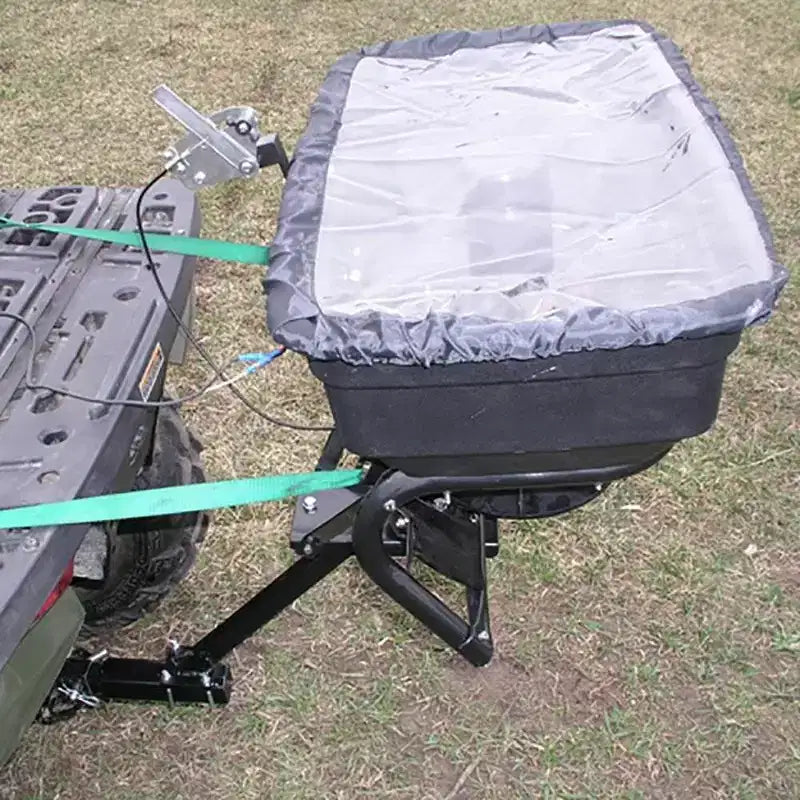 Field Tuff 12V 125 Pound Capacity Grass Seed Fertilizer Spreader with Hitch Mount Receiver and Rain Protector for ATV, UTV, or Utility Tractor