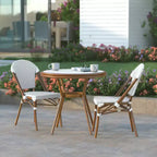 Emma & Oliver Colmar Indoor/Outdoor Bistro Style 31.5 in. Table with PE Rattan, Glass Top, and Two Chairs - Metal Frame
