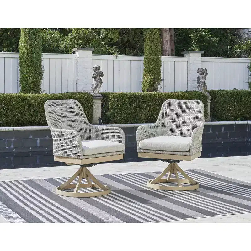 Signature Design by Ashley Seton Creek Outdoor Swivel Dining Chair (Set of 2), Gray