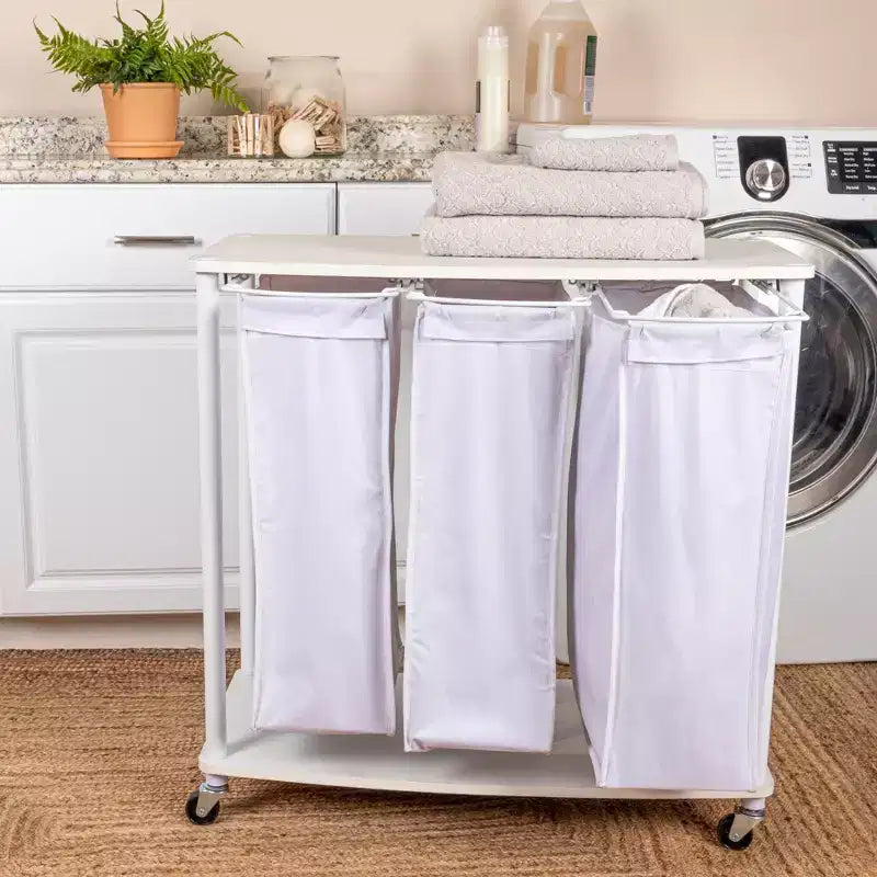 3-Bag Laundry Center, Smooth Laminate Shelving, Sturdy Steel Frame, Hanging Bar, Wheeling and Stationary Feet Options